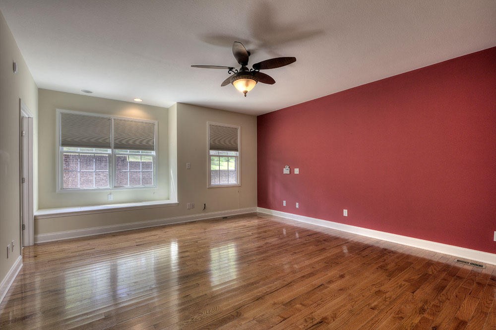 1400 Grimes Road Loudon, TN 37774 - Photo 19 of 32 a view of an empty room with window and wooden floor