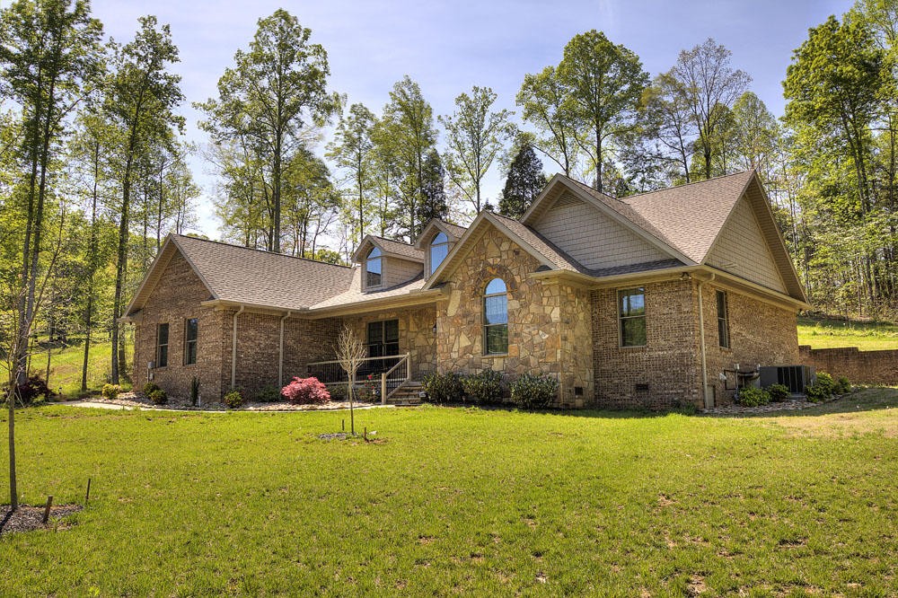 1400 Grimes Road Loudon, TN 37774 - Photo 6 of 32 a front view of house with yard and green space