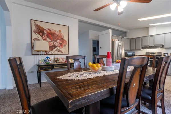 a view of a dining room with furniture