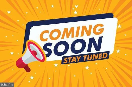 a street sign under a blue umbrella