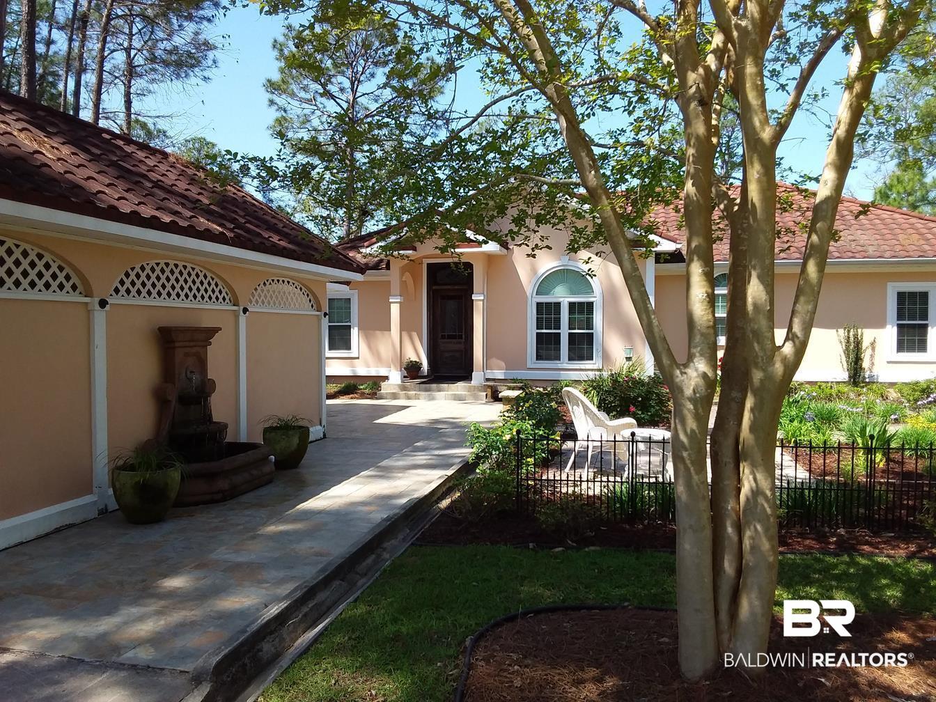 8491 Bay Harbor Road Elberta, AL 36530 - Photo 4 of 50 Entry walkway and garden