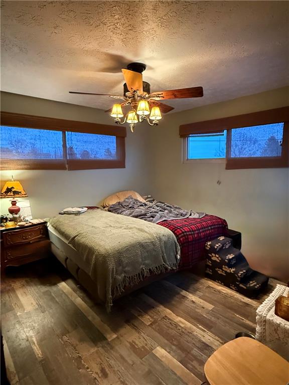 130 Crescent Drive Washington, PA 15301 - Photo 5 of 11 a bedroom with bed and a chandelier