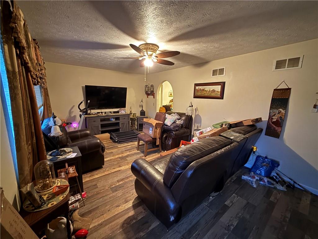 130 Crescent Drive Washington, PA 15301 - Photo 7 of 11 a living room with furniture a flat screen tv and a window