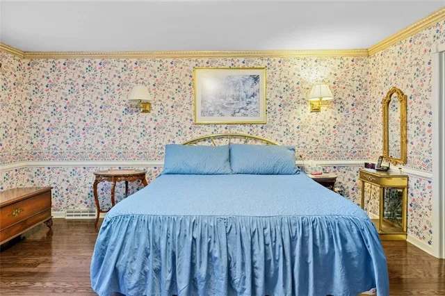 a bathroom with a shower and a sink