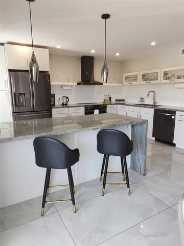 $595,000 | 1075 92nd Street, Unit 405, Bay Harbor Islands, FL 33154