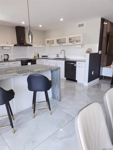 $595,000 | 1075 92nd Street, Unit 405, Bay Harbor Islands, FL 33154