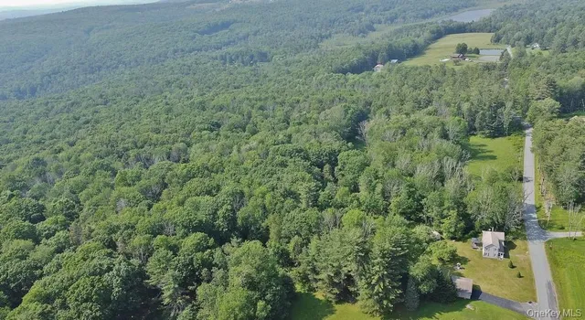 an aerial view of residential house with outdoor space
