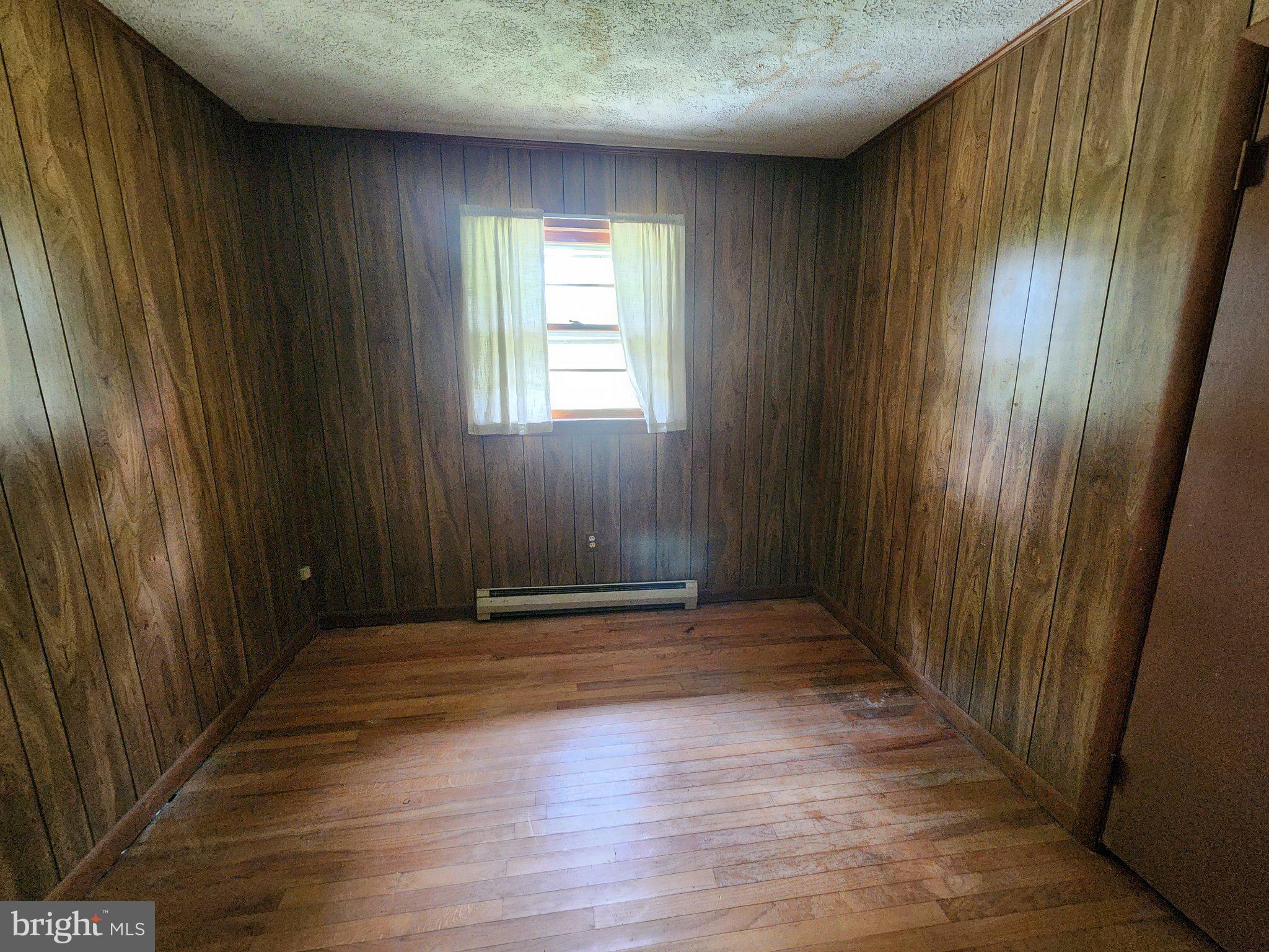 5361 Balls Mill Road Midland, VA 22728 - Photo 18 of 24 Cozy room with warm wooden accents.