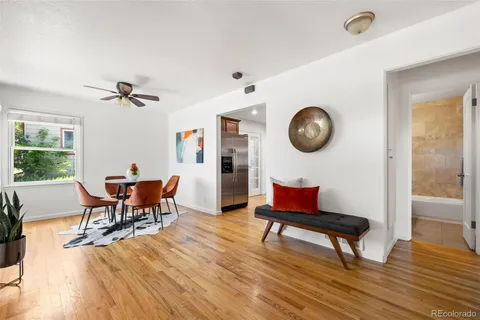 a view of a livingroom with furniture and a table