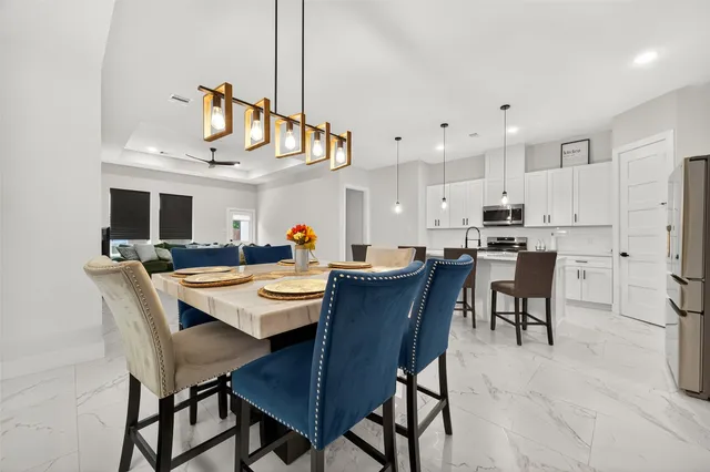 a view of kitchen with cabinets and wooden floor
