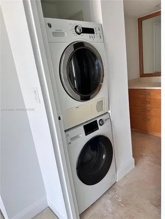 a view of living room with furniture and a window