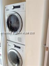 2333 Brickell Avenue, Unit 2215 Miami, FL 33129 - Photo 15 of 27 a utility room with dryer and washer