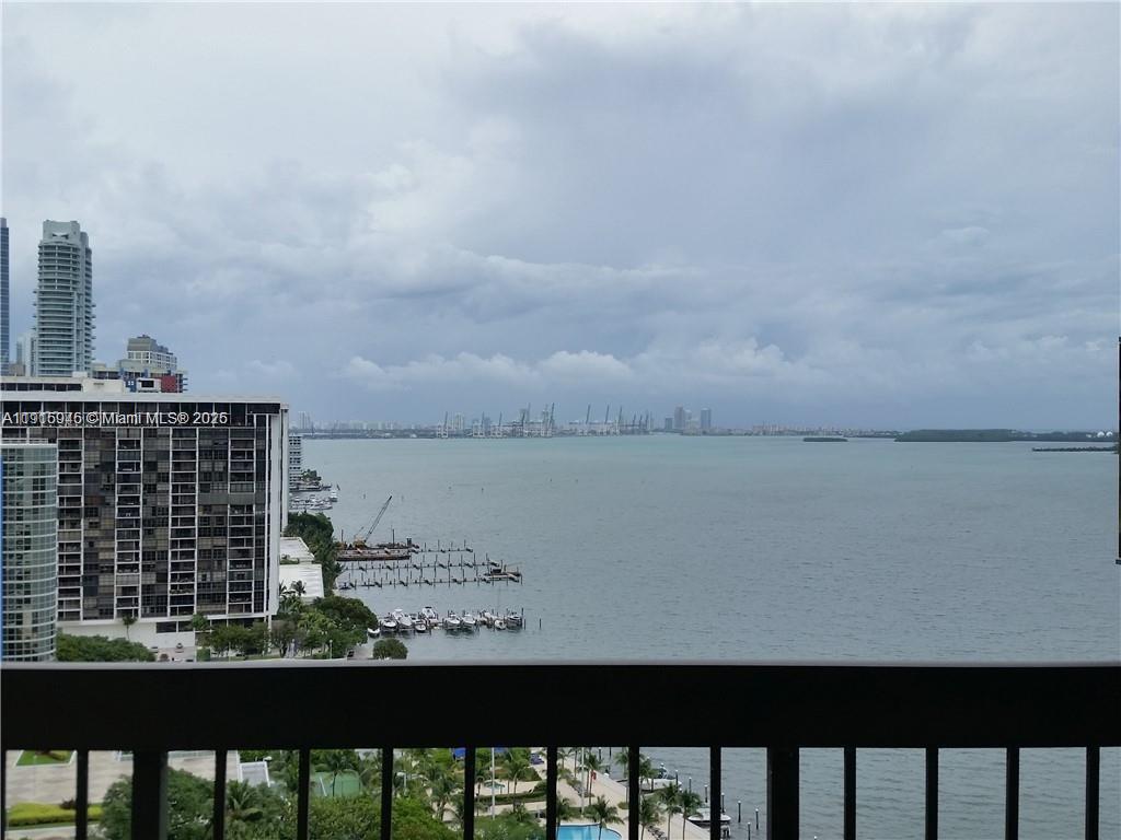 2333 Brickell Avenue, Unit 2215 Miami, FL 33129 - Photo 6 of 27 a view of a balcony with two chairs and a table