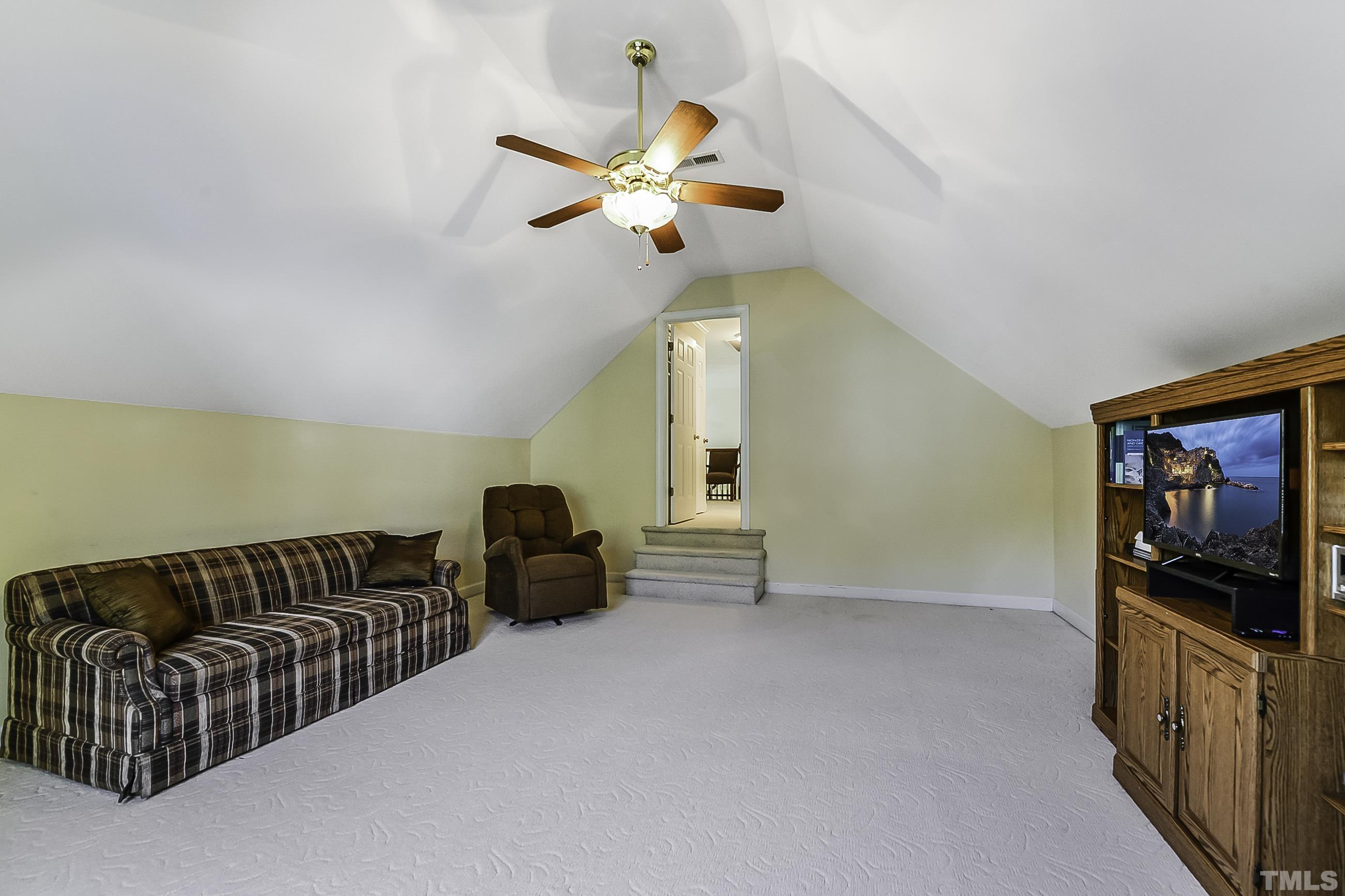7929 Milltrace Run Raleigh, NC 27615 - Photo 26 of 36 a living room with furniture