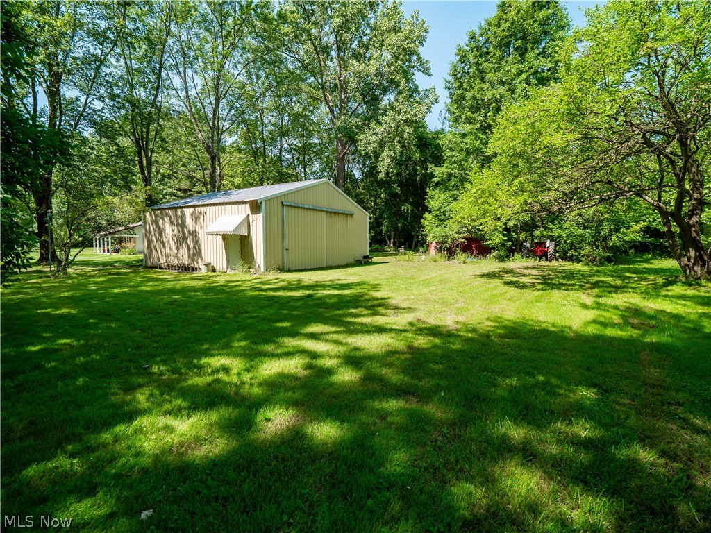 4094 Stoney Ridge Road Avon, OH 44011 - Photo 26 of 36 32 x 30 Outbuilding with concrete flooring.