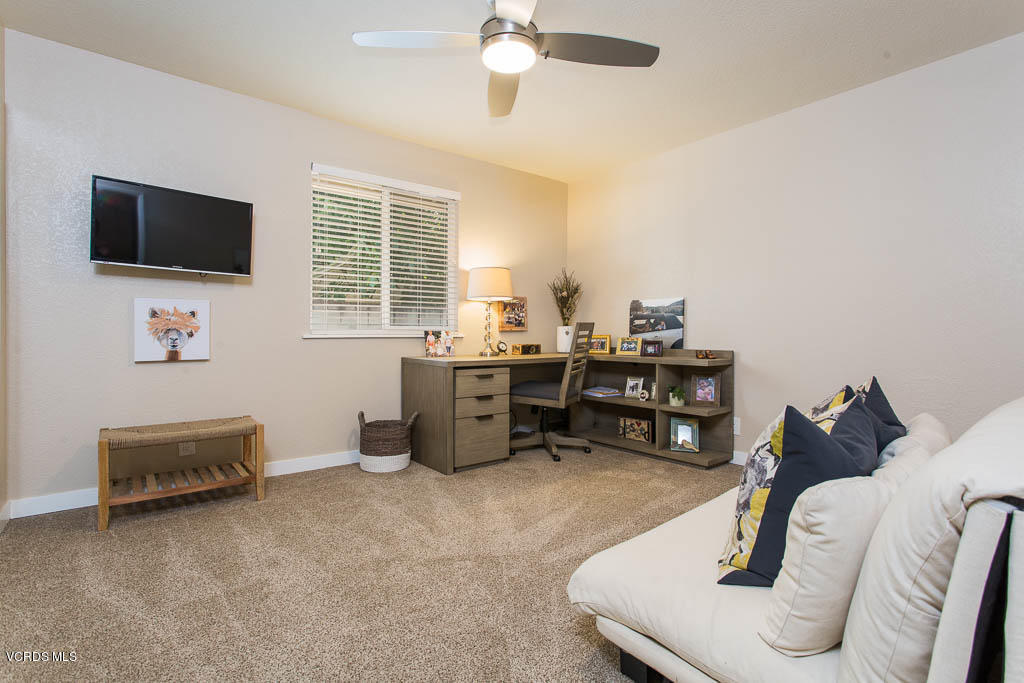 4123 Eve Road Simi Valley, CA 93063 - Photo 14 of 36 a room with furniture and a flat screen tv