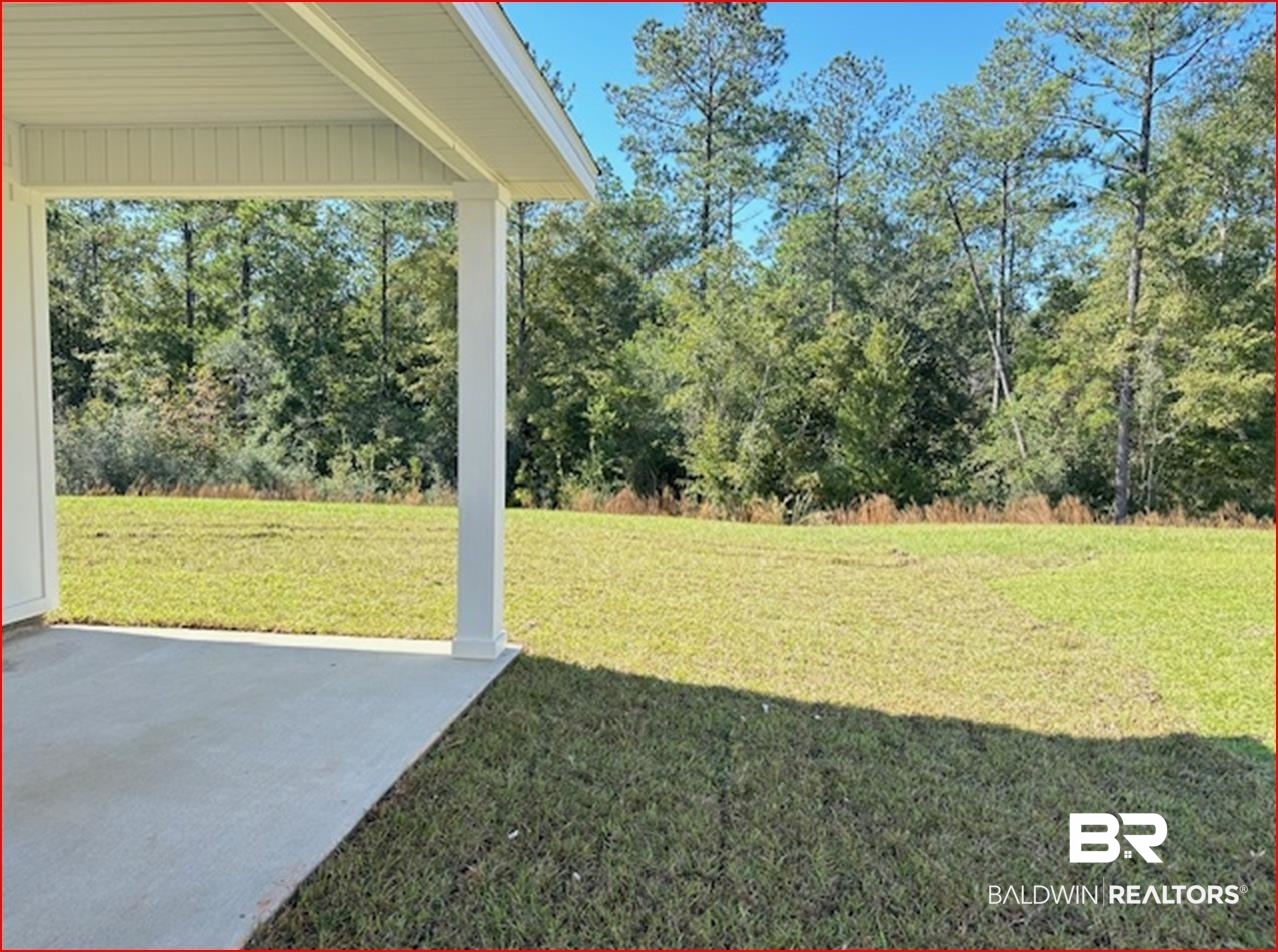 13906 Antler Hl Road Daphne, AL 36527 - Photo 12 of 23 View of yard featuring a patio area