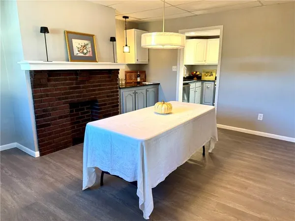 a bed room with a bed and dresser