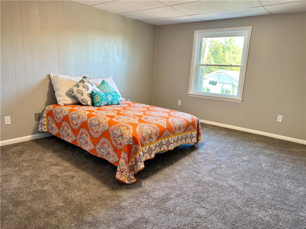 532 North Elm Street Butler, PA 16001 - Photo 18 of 31 a bed sitting in a bedroom next to a window