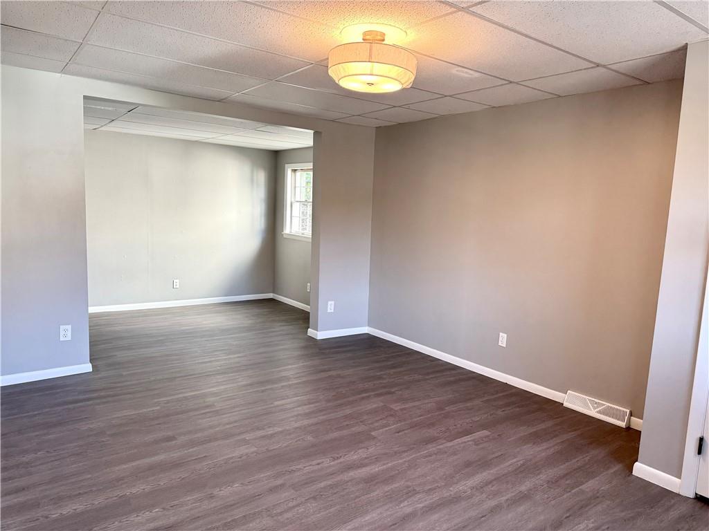 532 North Elm Street Butler, PA 16001 - Photo 6 of 31 a view of an empty room with wooden floor and a window