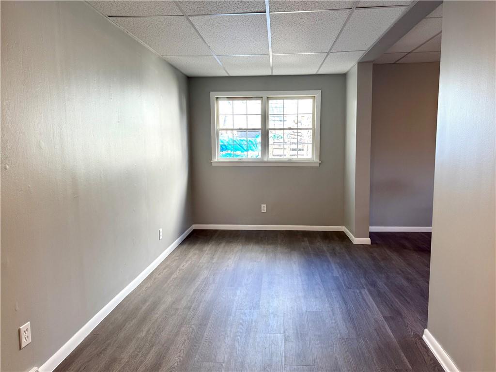 532 North Elm Street Butler, PA 16001 - Photo 10 of 31 an empty room with wooden floor and windows