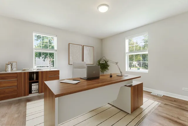 a view of kitchen with granite countertop window