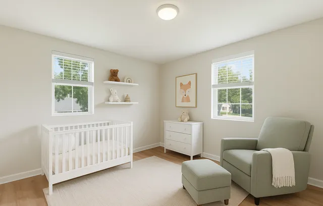 a bedroom with furniture and a window