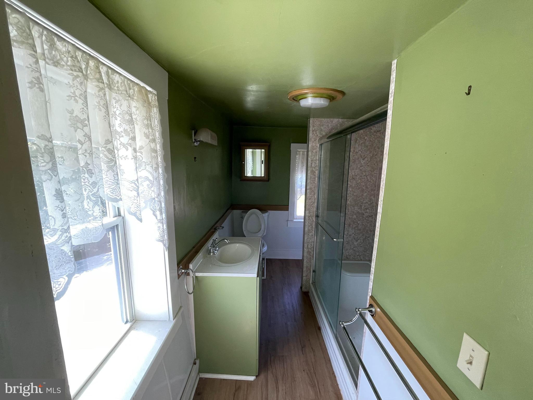 707 Old Liberty Road Sykesville, MD 21784 - Photo 23 of 31 a workspace with furniture and a window