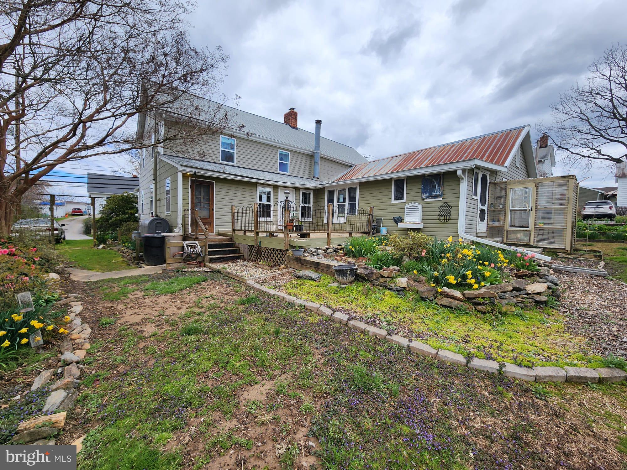 707 Old Liberty Road Sykesville, MD 21784 - Photo 31 of 31 a front view of a house with garden