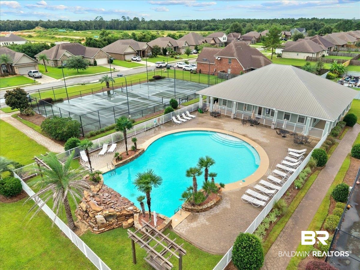 7056 Rocky Rd Loop Gulf Shores, AL 36542 - Photo 38 of 41 Community pool with a residential view and a patio area