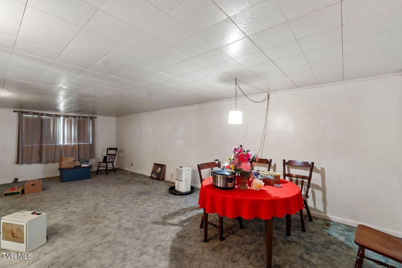 1811 Old Tusculum Road Greeneville, TN 37745 - Photo 17 of 27 Basement Living and Dining Combo