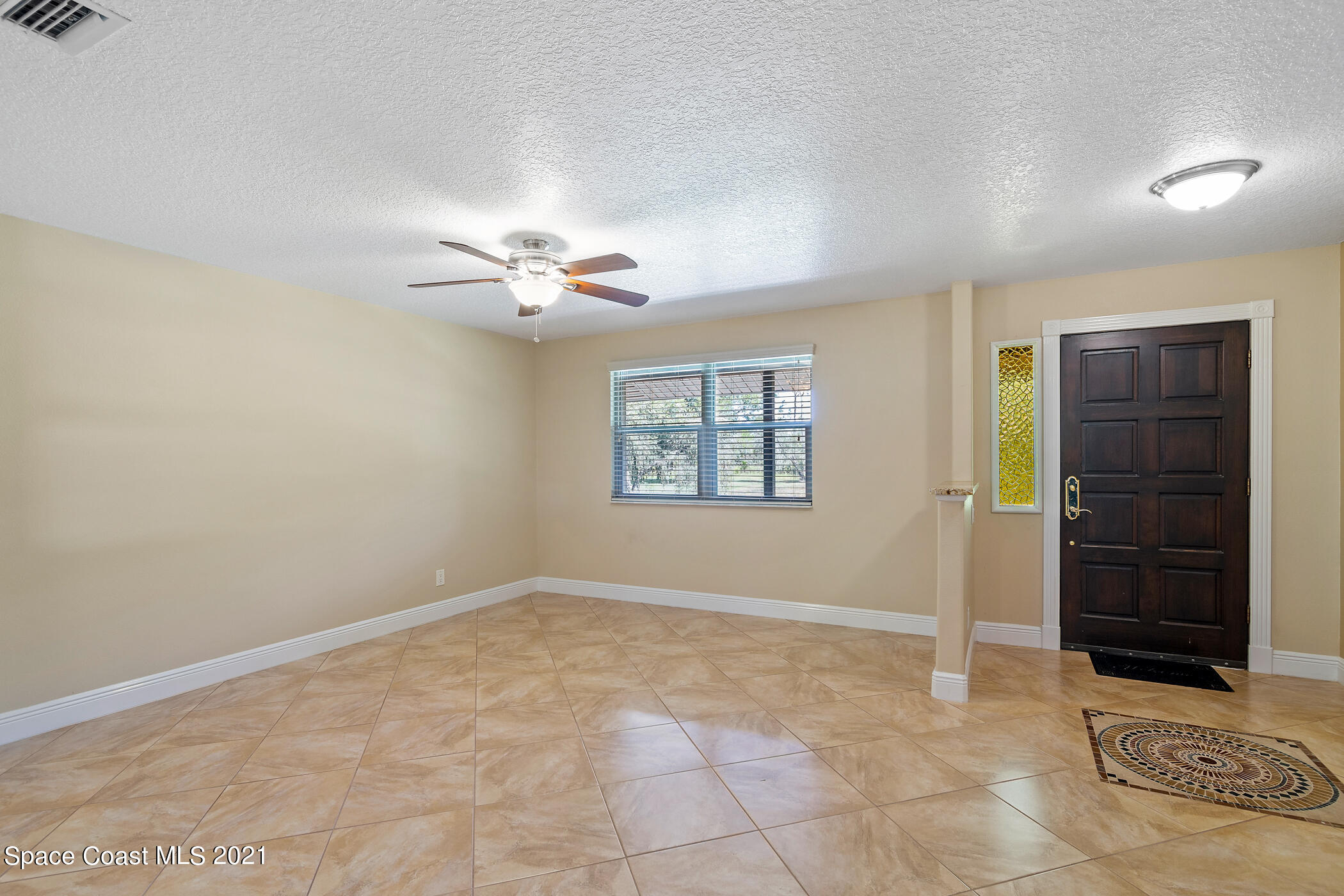1390 Friday Road Cocoa, FL 32926 - Photo 12 of 69 a view of an empty room with a window