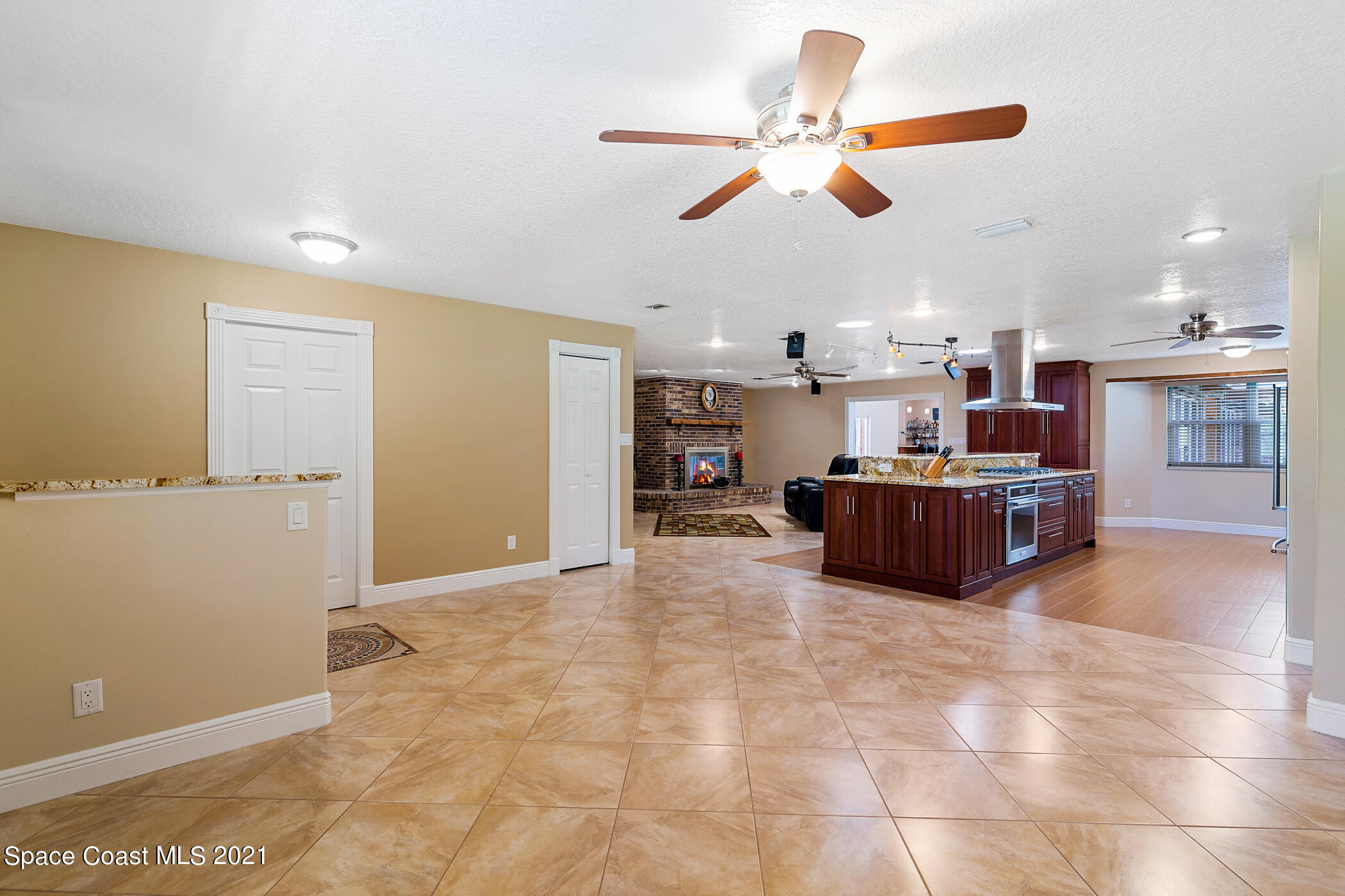 1390 Friday Road Cocoa, FL 32926 - Photo 13 of 69 a view of a livingroom with furniture and a ceiling fan