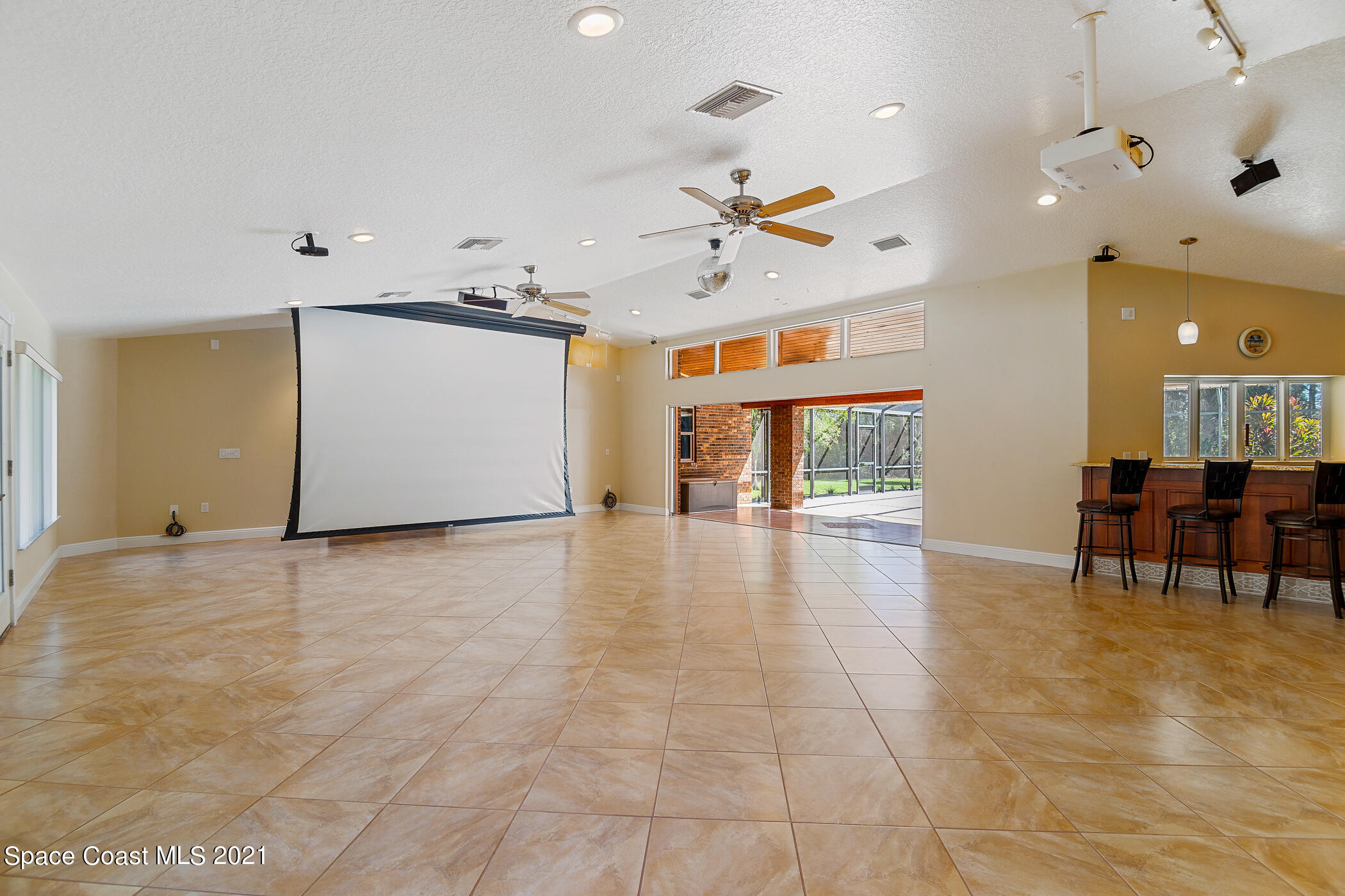 1390 Friday Road Cocoa, FL 32926 - Photo 34 of 69 a view of a livingroom with furniture and a ceiling fan