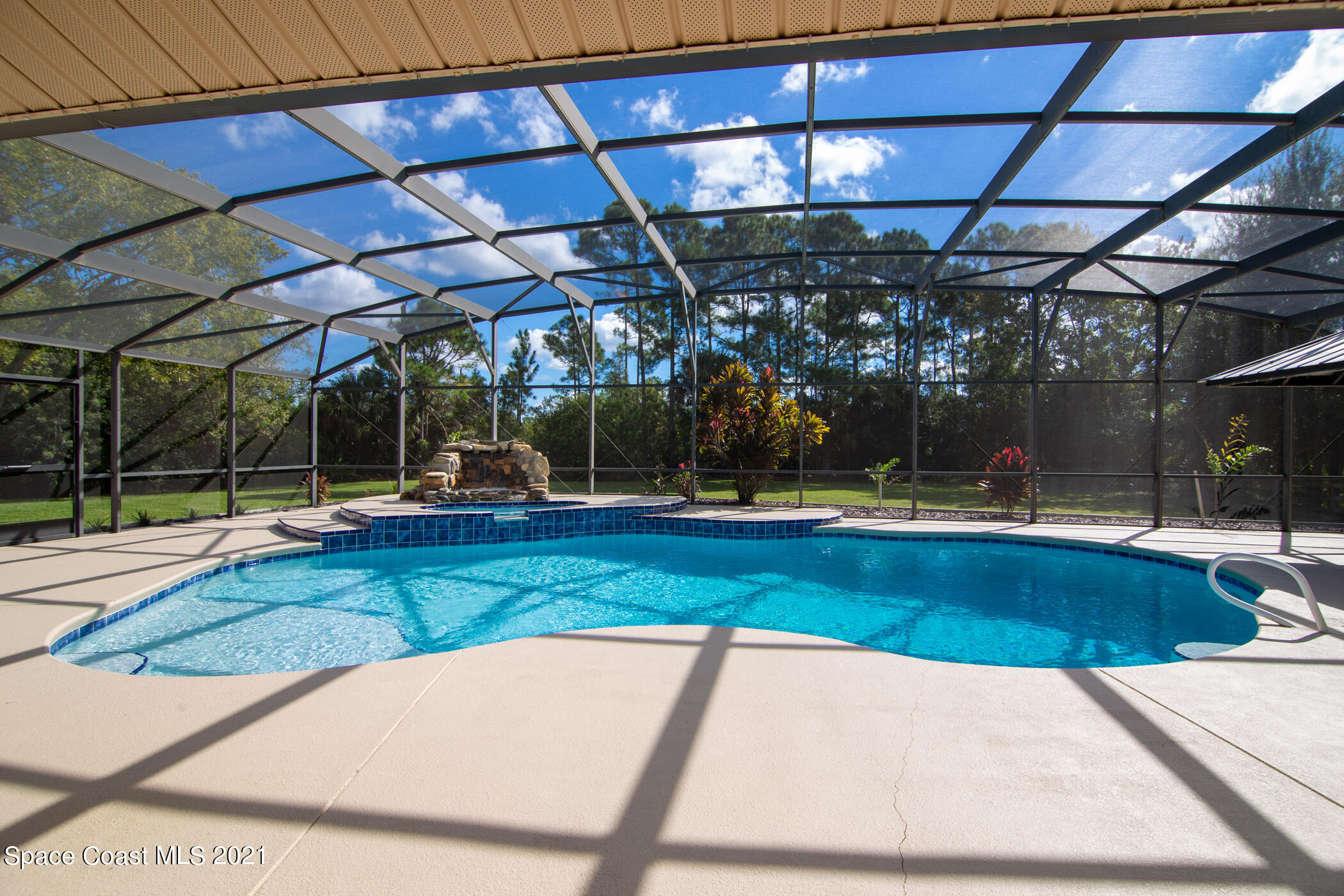 1390 Friday Road Cocoa, FL 32926 - Photo 48 of 69 a view of a swimming pool with a patio