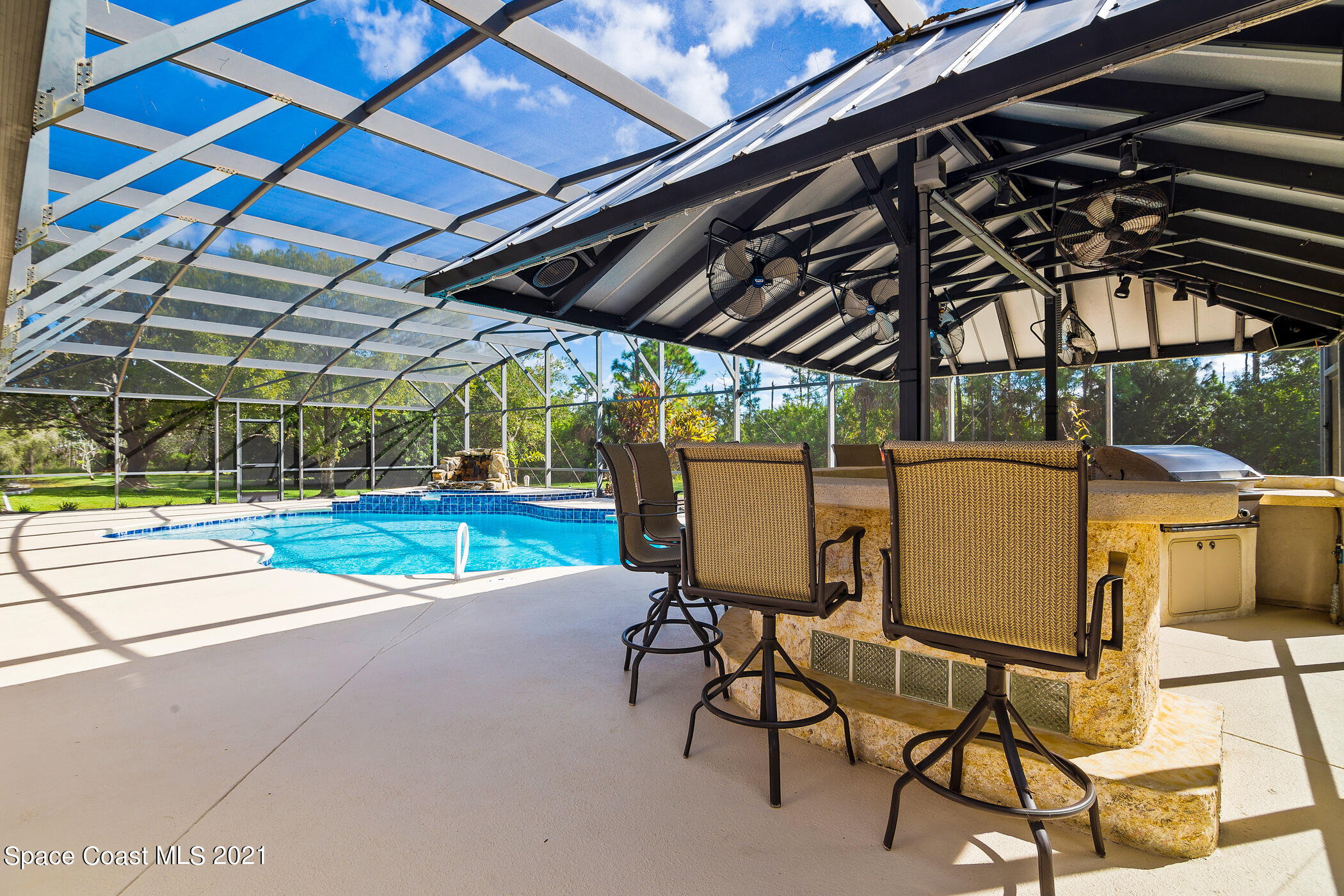 1390 Friday Road Cocoa, FL 32926 - Photo 50 of 69 a view of patio with table and chairs and potted plants