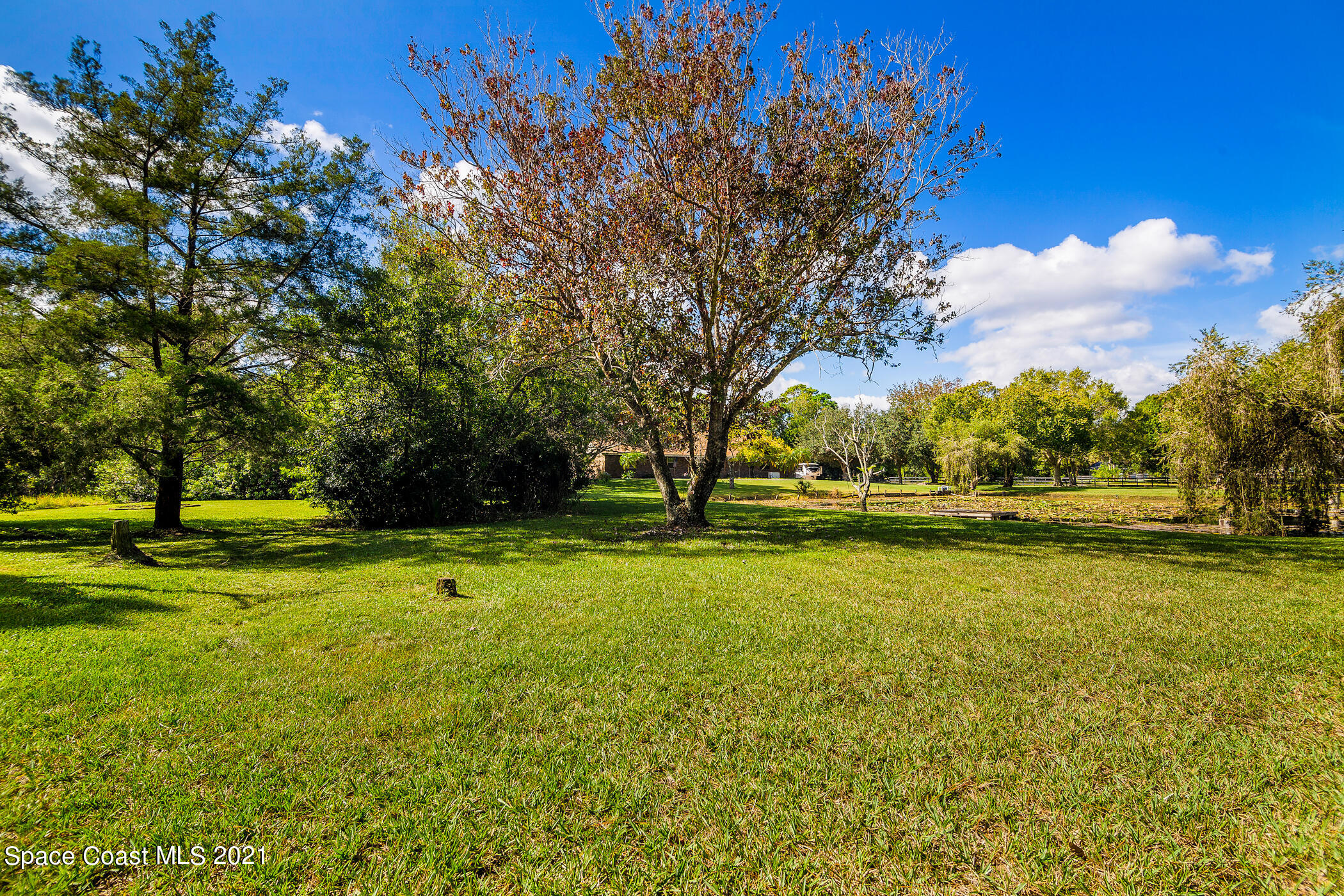 1390 Friday Road Cocoa, FL 32926 - Photo 58 of 69 a view of swimming pool with an outdoor space and seating area