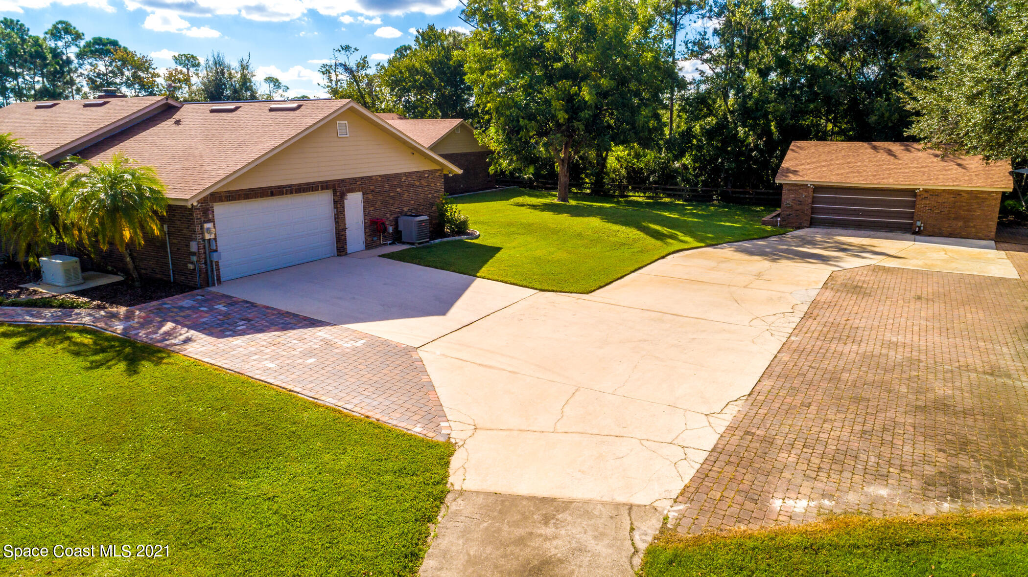 1390 Friday Road Cocoa, FL 32926 - Photo 7 of 69 a view of pool with lawn chairs and plants