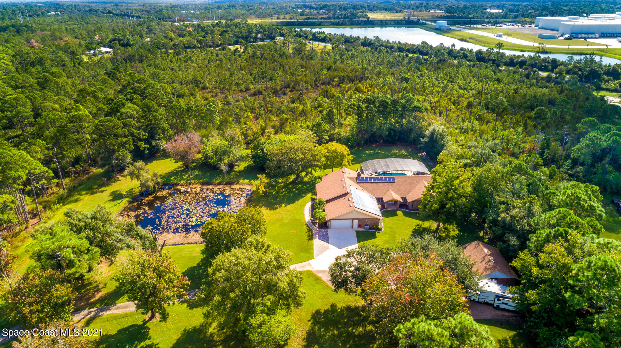 1390 Friday Road Cocoa, FL 32926 - Photo 69 of 69 a view of a lake with a house