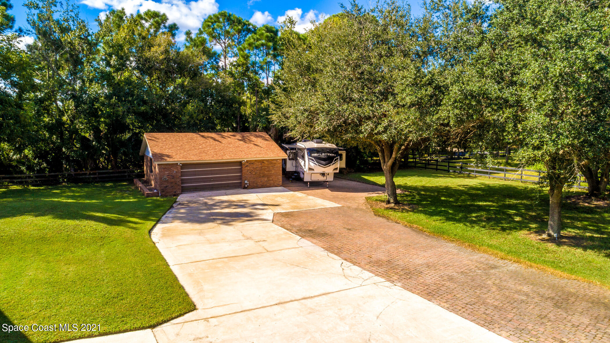 1390 Friday Road Cocoa, FL 32926 - Photo 8 of 69 a view of a garden with swimming pool