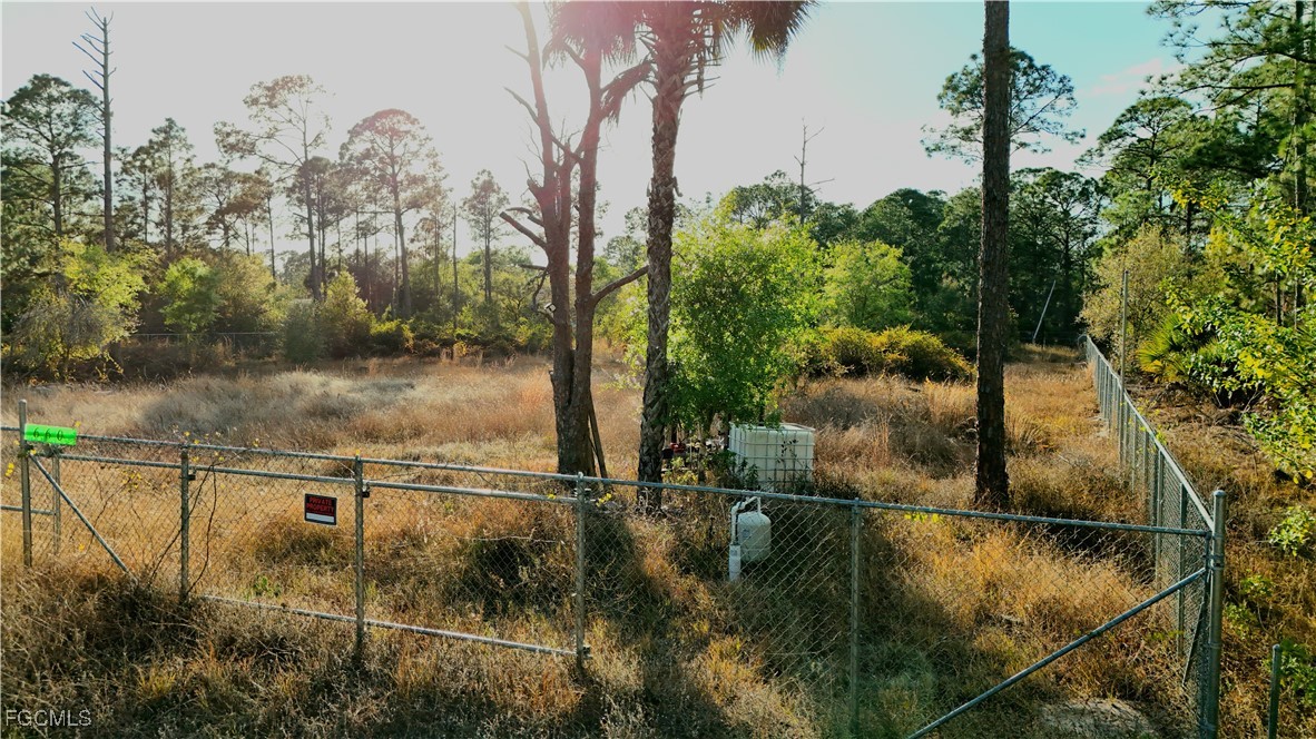 660 South Quebrada Street Clewiston, FL 33440 - Photo 2 of 8 a view of swimming pool from a lake