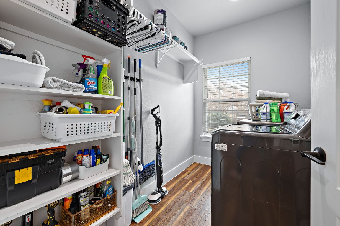 611 Elliott Street Taylor, TX 76574 - Photo 24 of 29 a room with storage and utility