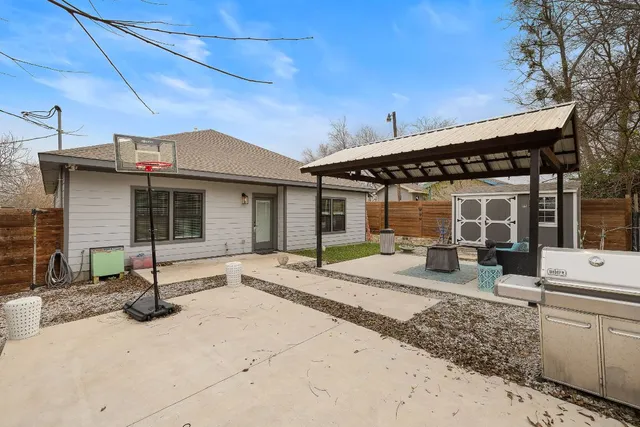 a front view of a house with garden and porch