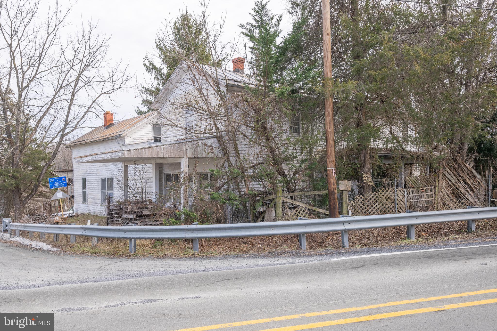 12 Conicville Road Mount Jackson, VA 22842 - Photo 5 of 14 a view of a house with a patio and a yard