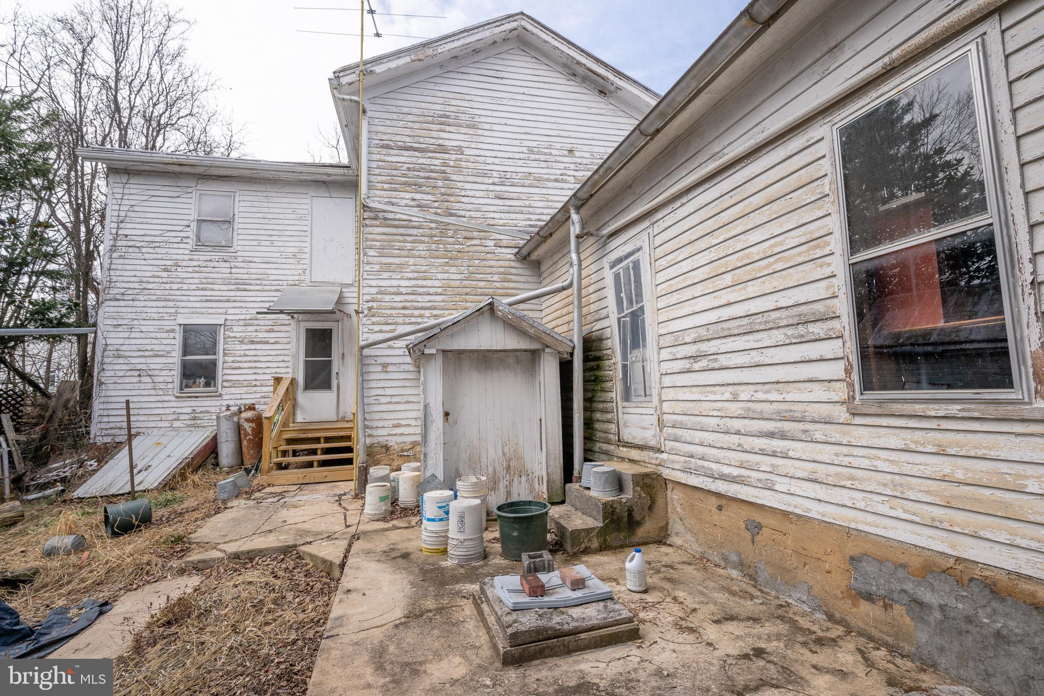 12 Conicville Road Mount Jackson, VA 22842 - Photo 9 of 14 a backyard of a house with outdoor seating