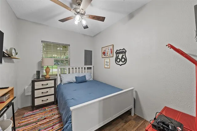 a kitchen with stainless steel appliances a stove top oven a refrigerator a sink and dishwasher