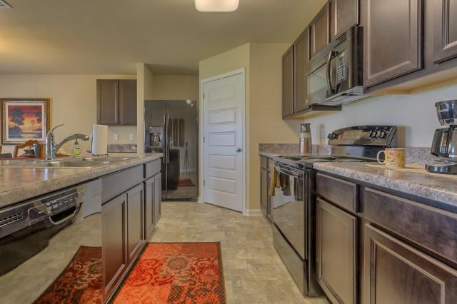 929 Merganser Way Crestview, FL 32539 - Photo 3 of 20 Cali Kitchen