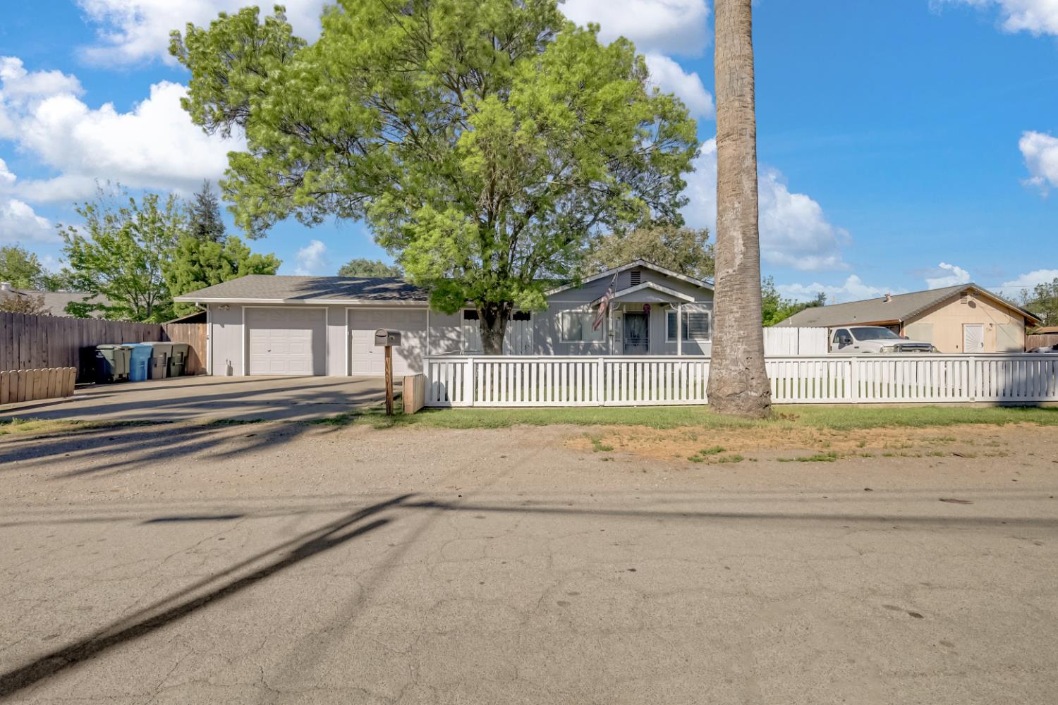 a house with a wooden fence