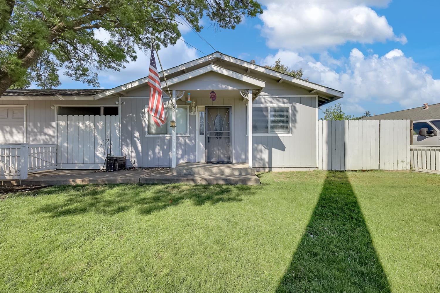 2130 Palm Street Sutter, CA 95982 - Photo 2 of 27 a front view of a house with a yard