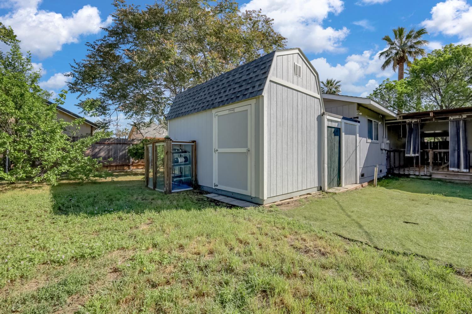 2130 Palm Street Sutter, CA 95982 - Photo 25 of 27 a view of backyard of house and garage